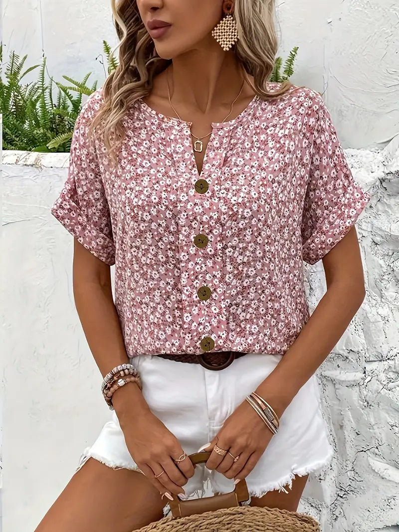 Blouse à manches courtes avec patte de boutonnage fleurie pour femme