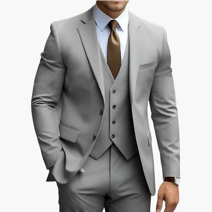 Elegant men's suit with jacket, vest, and trousers