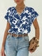 Blouse fleurie avec col en V