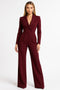 Elegant wrap jumpsuit with long sleeves – the ideal feminine silhouette for the office and evening.