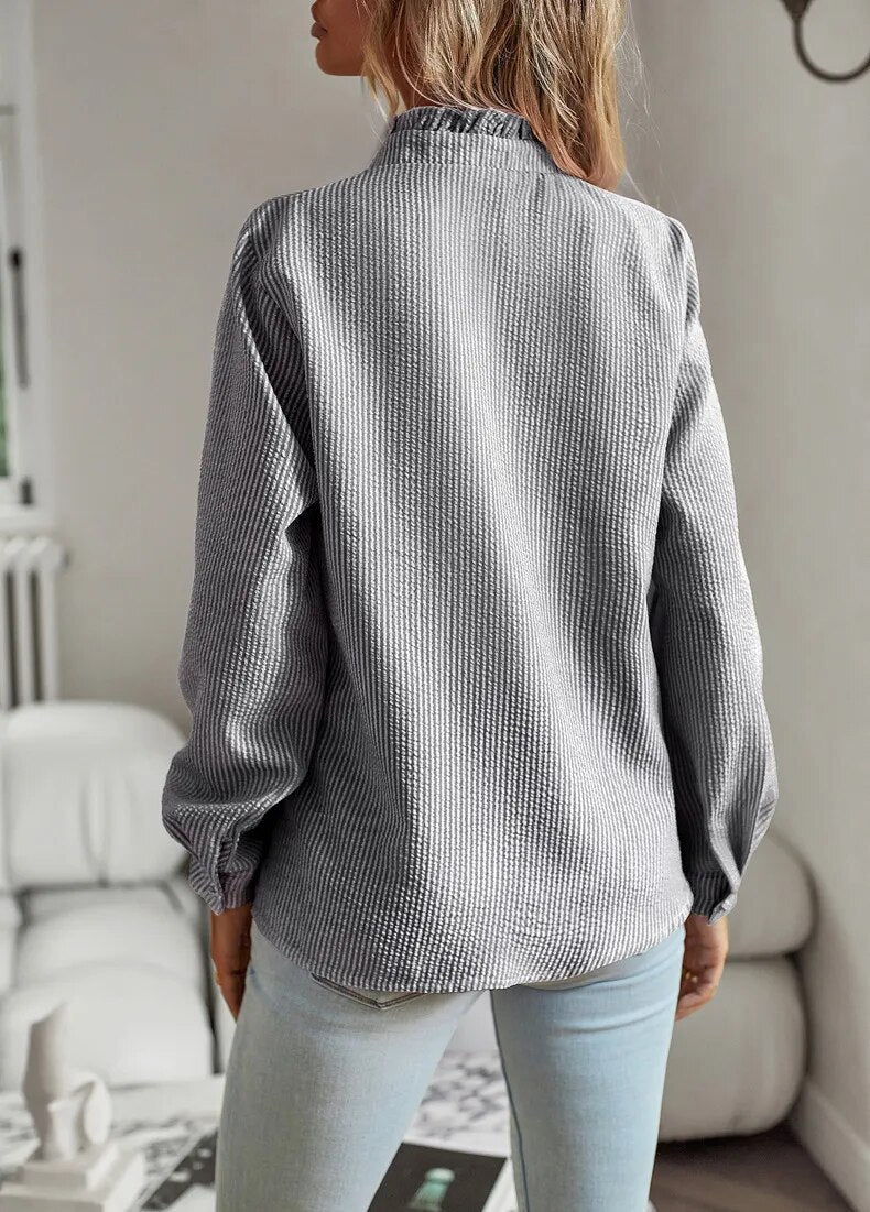 Blouse élégante à manches longues pour femme avec col montant