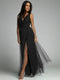 Luxurious women's evening dress with tulle and slit