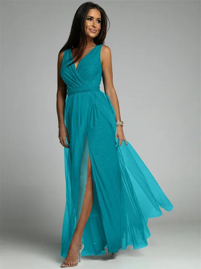 Luxurious women's evening dress with tulle and slit
