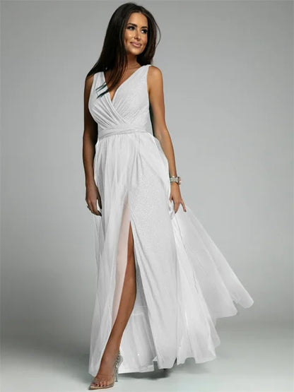 Luxurious women's evening dress with tulle and slit