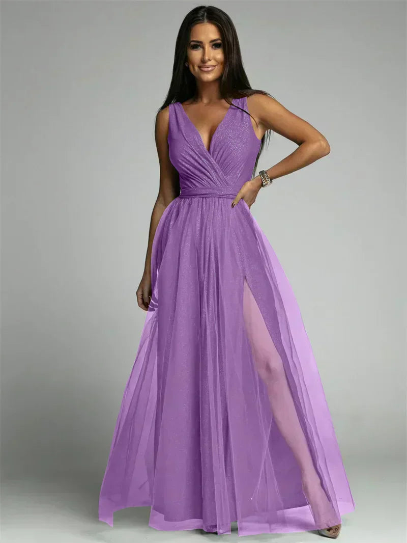 Luxurious women's evening dress with tulle and slit