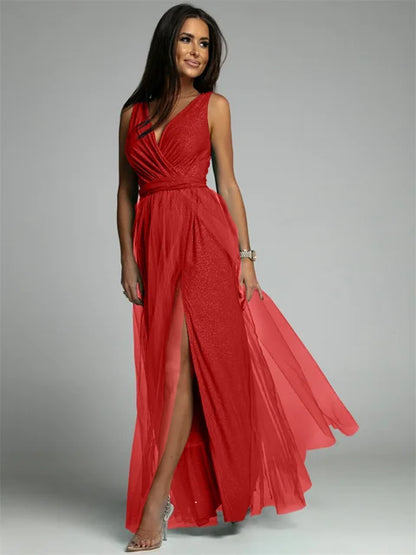 Luxurious women's evening dress with tulle and slit