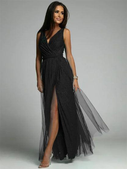 Luxurious women's evening dress with tulle and slit
