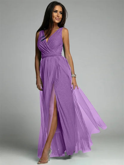 Luxurious women's evening dress with tulle and slit