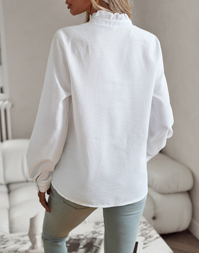 Blouse élégante à manches longues pour femme avec col montant