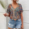 Blouse bohème femme manches chauve-souris col en V tissu aéré
