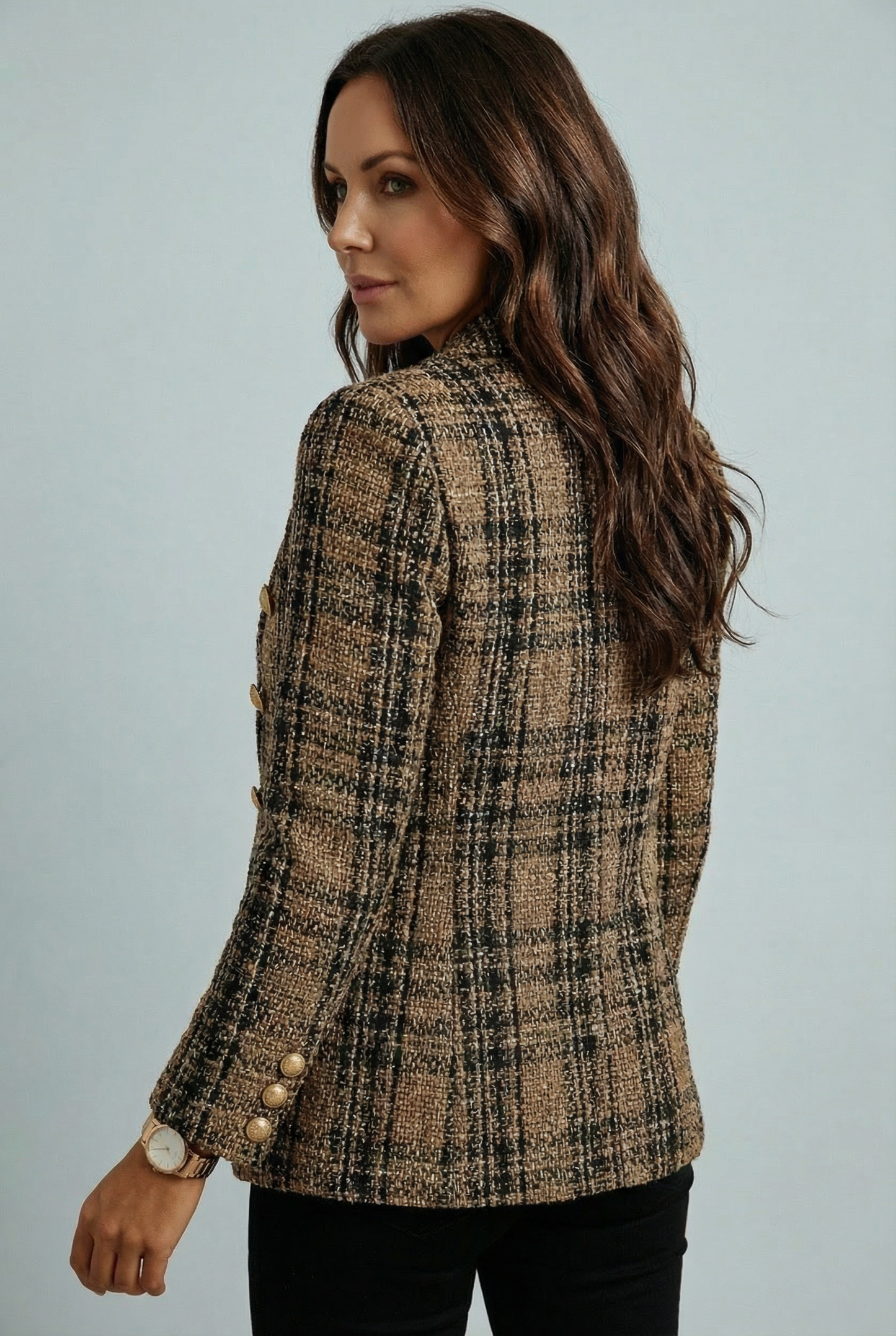 Women's blazer with check pattern and double-breasted button closure