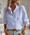 Stylish women's blouse with ruffles and long sleeves