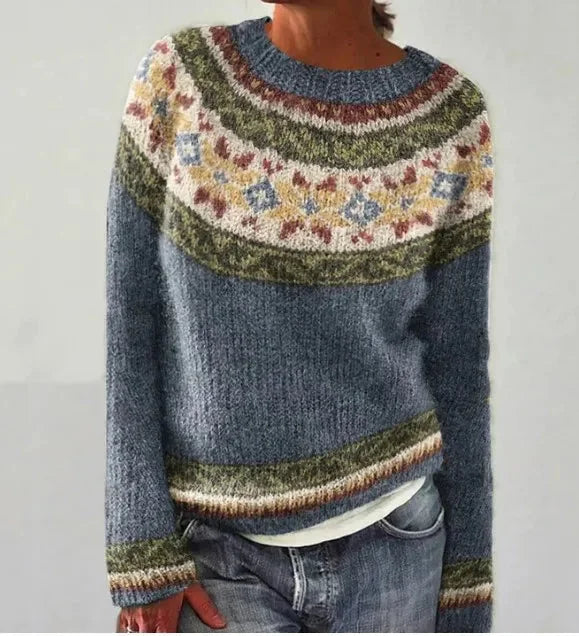 Pull femme multicolore à rayures, col bateau, en tricot doux et respirant.