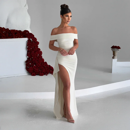 Robe longue femme en tissu léger, épaules dénudées, fente élégante pour plus de mouvement et de confort.