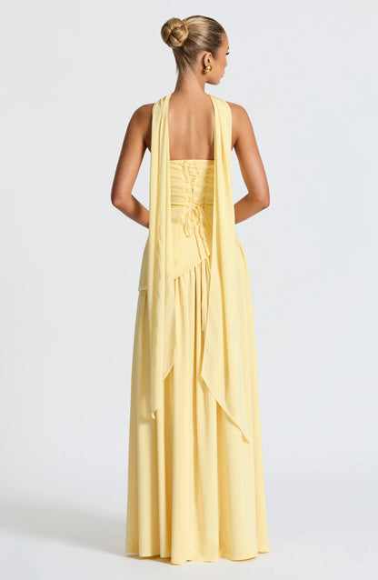 Robe longue femme en coton avec col ras-du-cou et fente sur le côté, idéale pour un look décontracté et élégant.