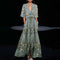 Long green floral dress with V-neck and pockets