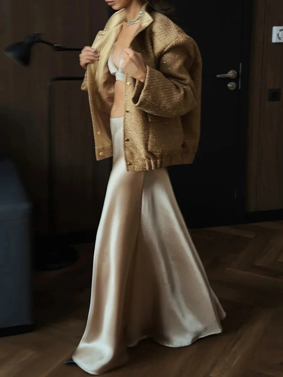 Veste femme à paillettes, coupe élégante, conçue pour les occasions festives et les cocktails.